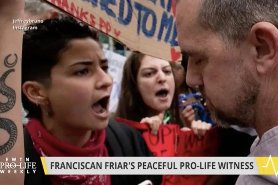 Fr. Fidelis Moscinski, CFR (right) encounters protesters during the July 10 "Witness for Life" prayer procession in Brooklyn.?w=200&h=150